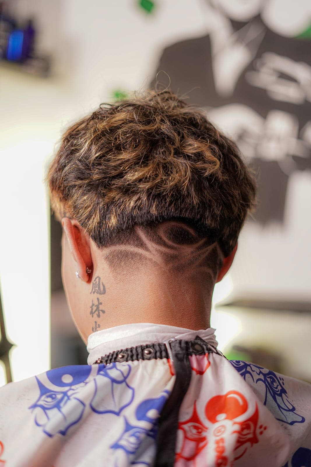 Design cut into a nape taper