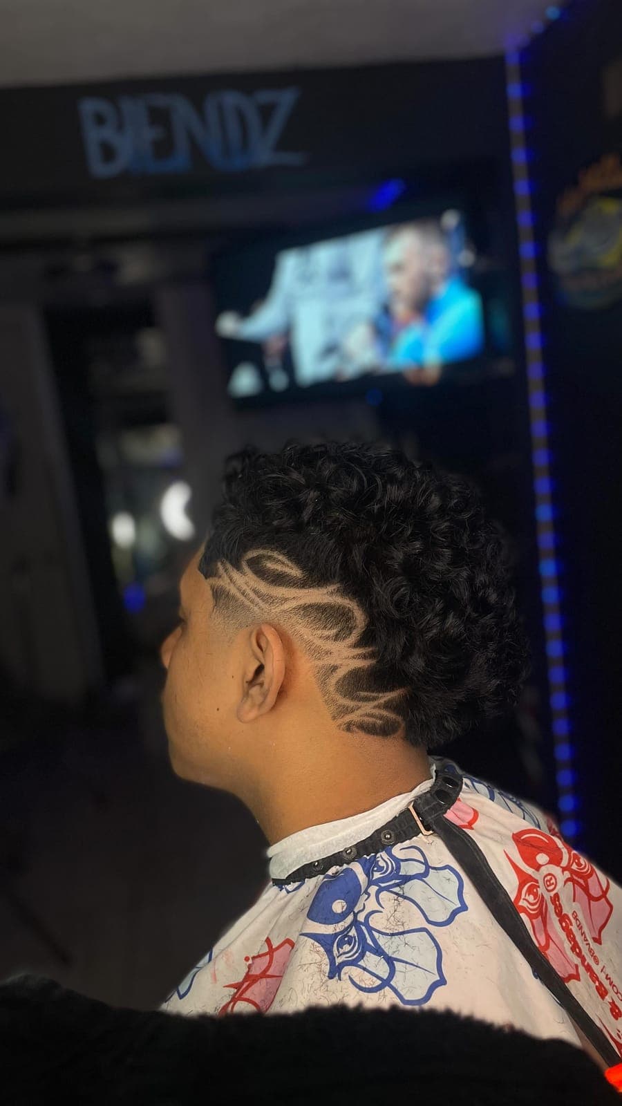 Swirl design under curly hair