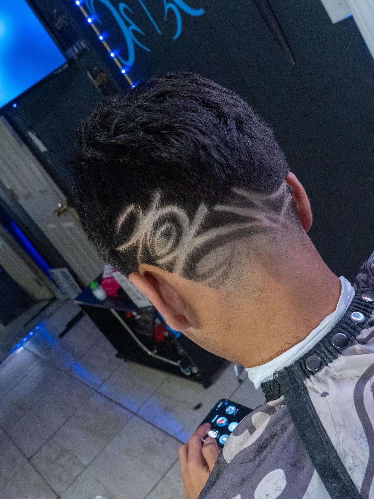 Tribal freestyle design on a fade
