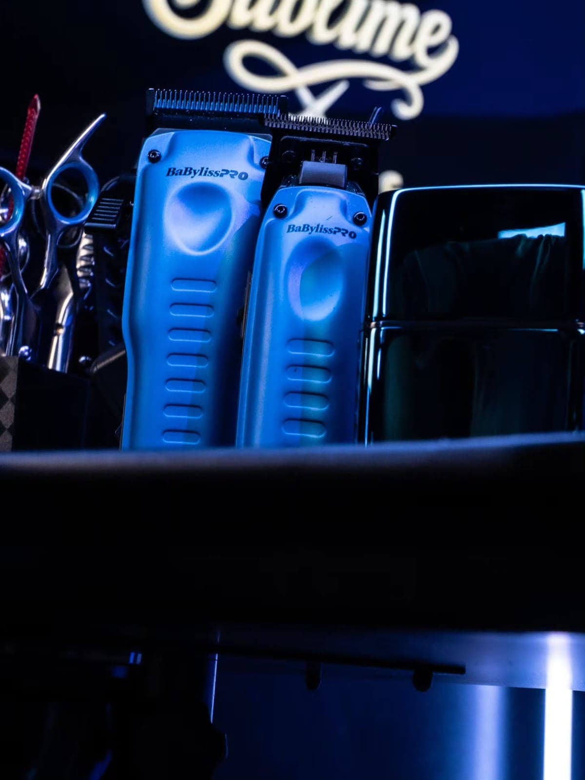 Clippers lined up under blue light