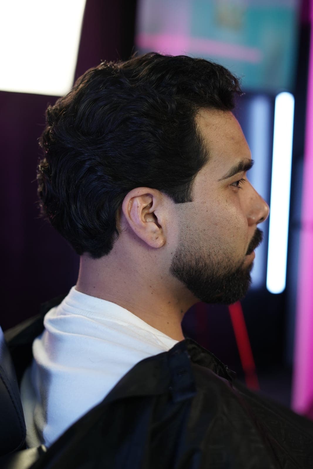 Side part with a tight beard